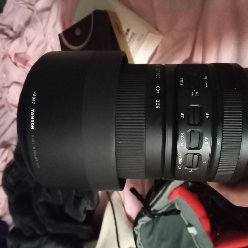 Black Telephoto Zoom Lens with Textured Focusing Ring and Robust Construction